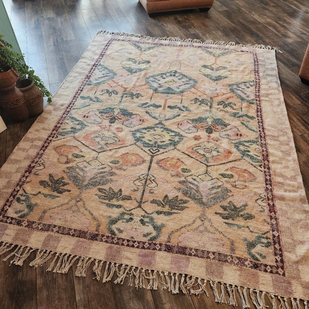 Gorgeous old world rug muted colors. Gently loved by Urban Outfitters
